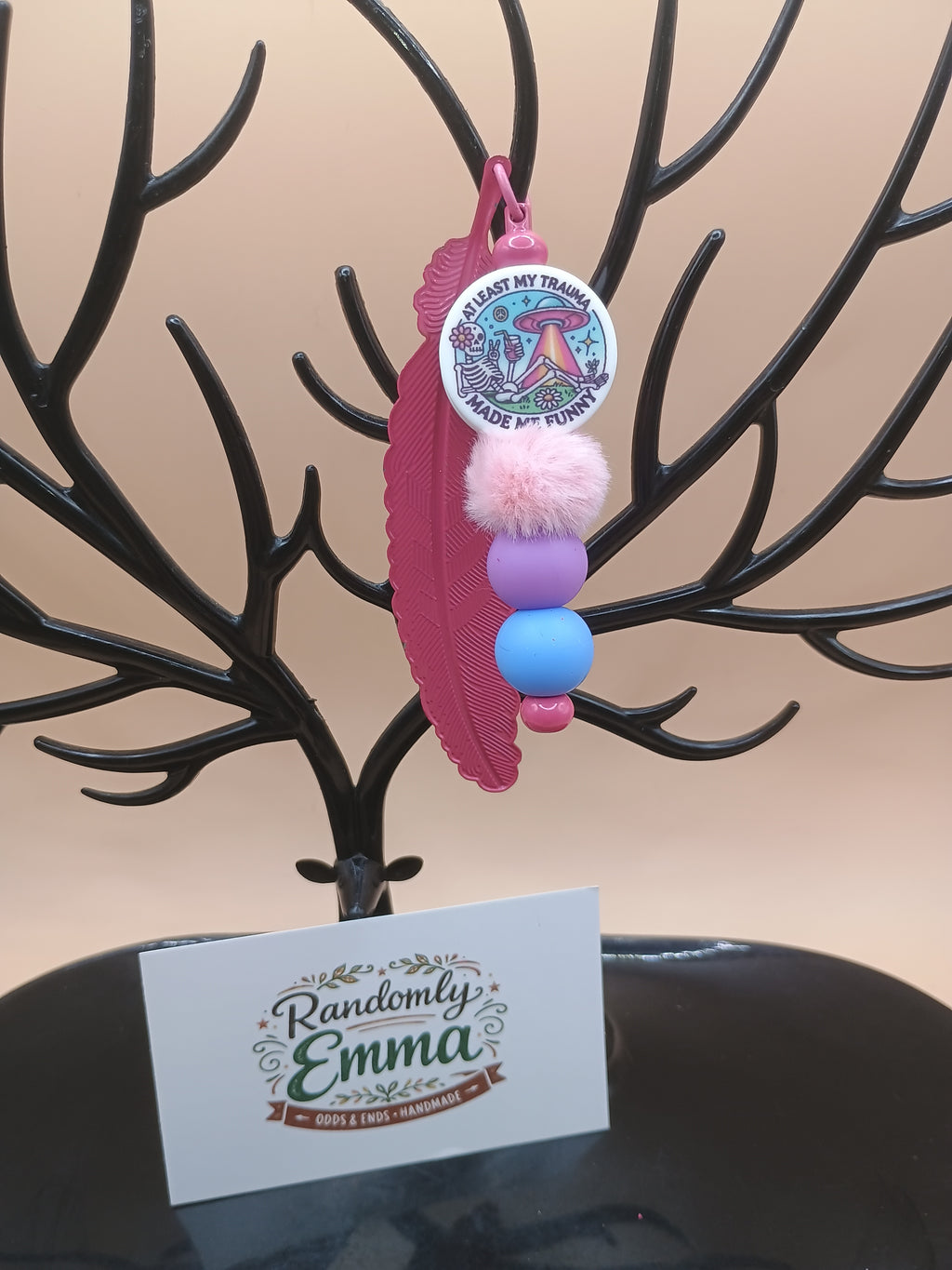 “Trauma Made Me Funny” Skeleton Space Feather Bookmark – Pink Metal Beaded Bookmark