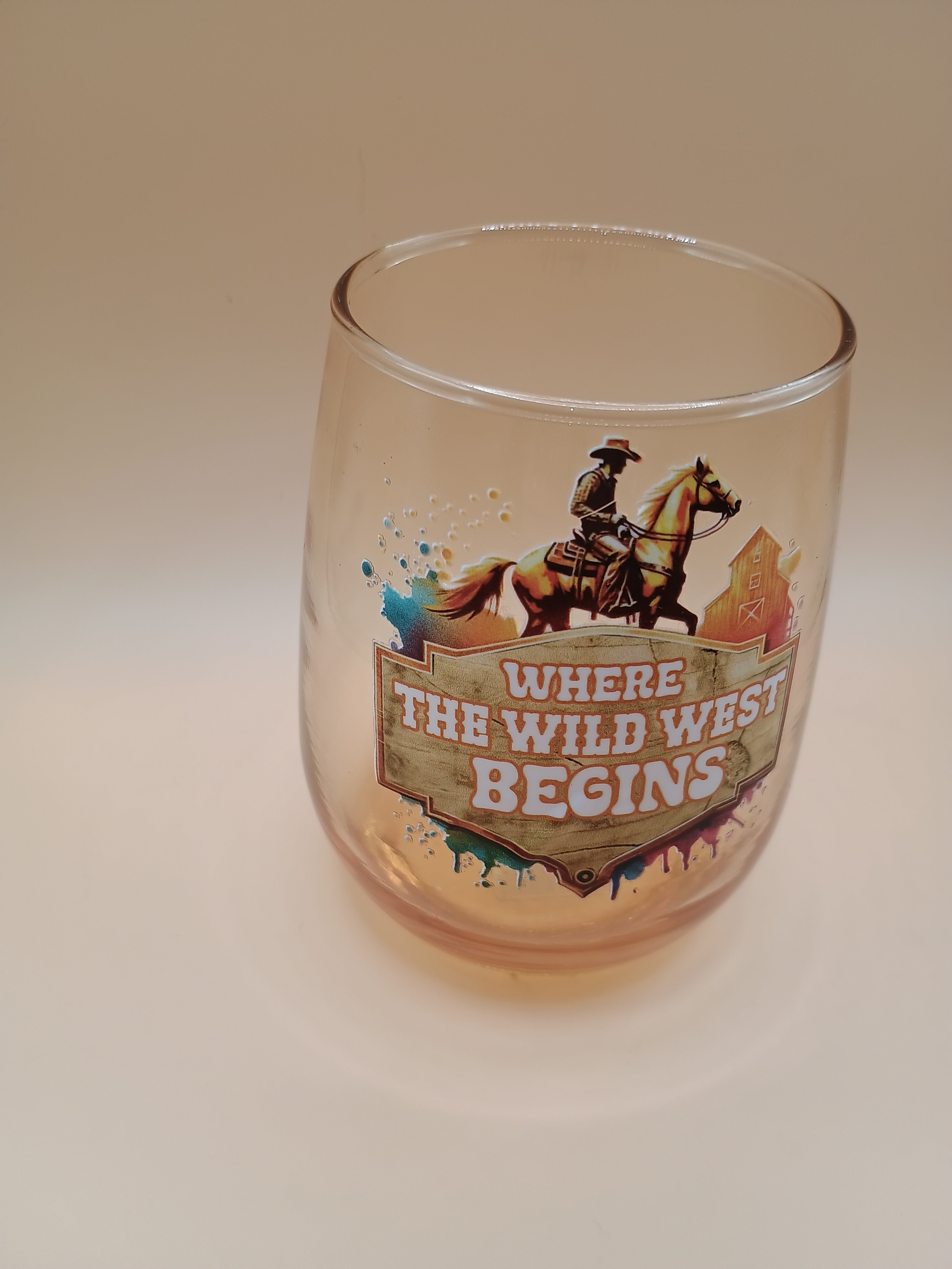 IMPERFECT “Where the Wild West Begins” Orange Tinted Stemless Wine Glass (Discounted)