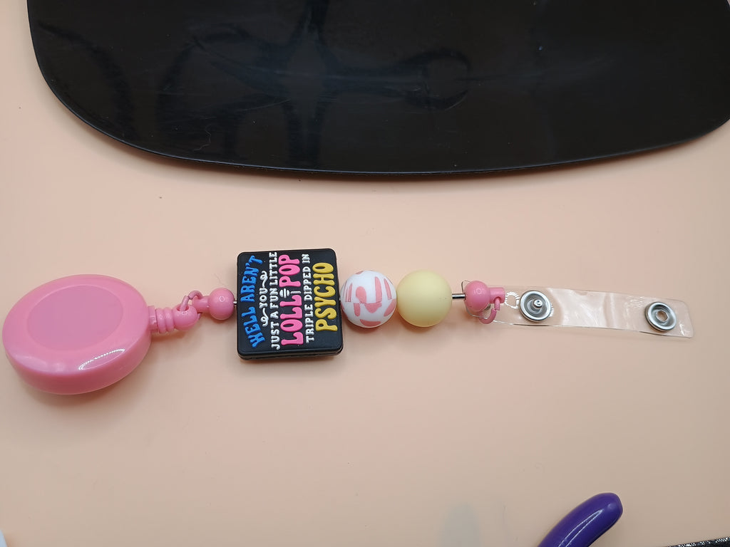 “Fun Little Lollipop Triple Dipped in Psycho” Beaded Badge Reel – Pink Retractable ID Holder