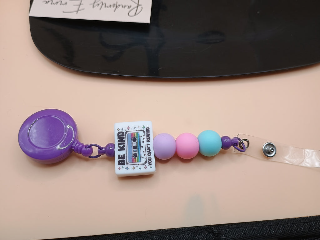 “Be Kind You Can’t Rewind” Beaded Badge Reel – Purple Retractable ID Holder